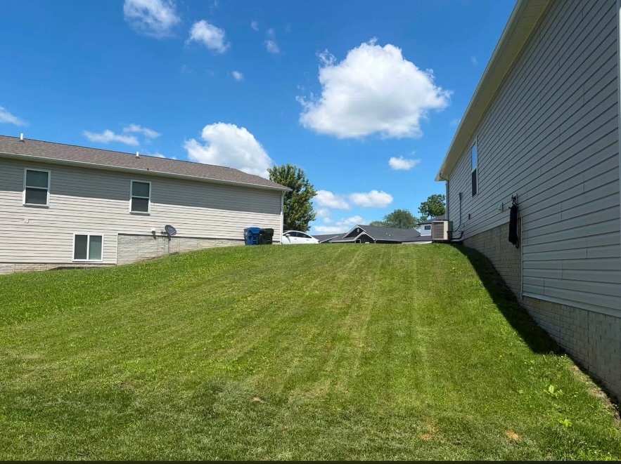Side yard cleanup & mow — Charlotte, NC
