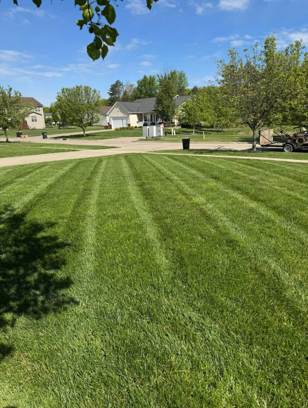 Striped front lawn cut — Charlotte metro
