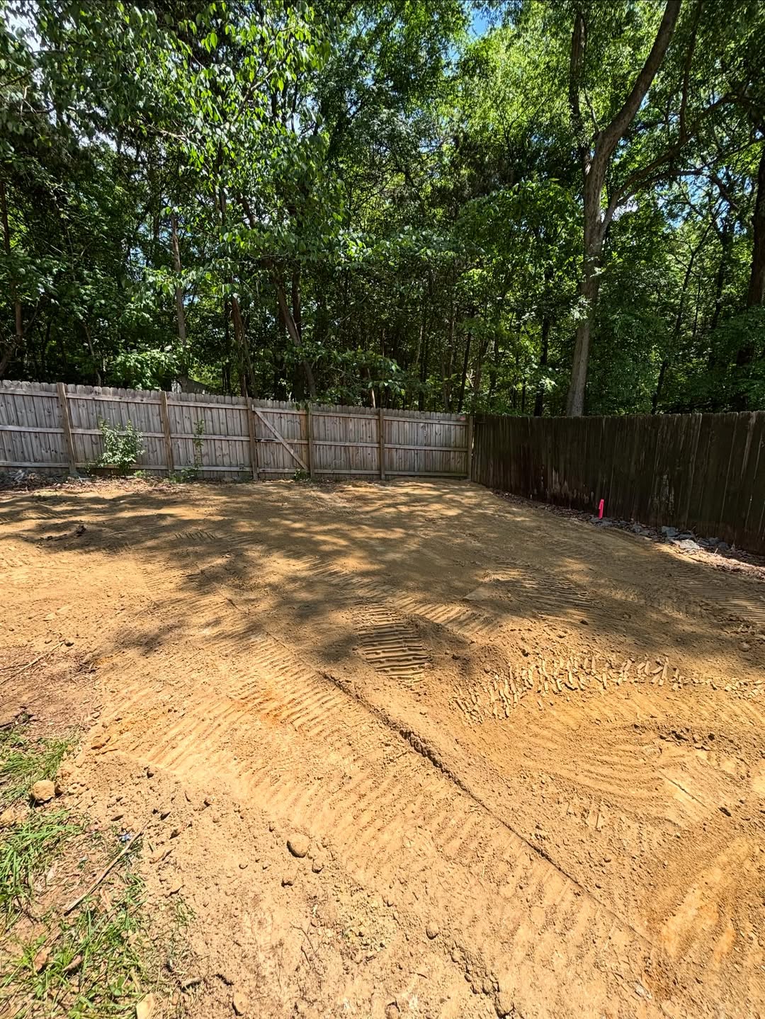 Backyard pad grading — Charlotte, NC